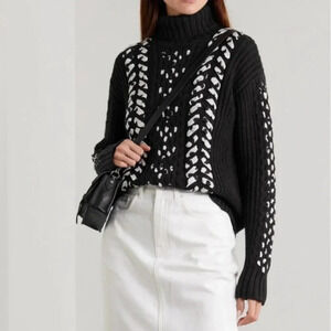 Jason Wu M Whipstitched Cable-knit Merino Wool
Turtleneck Sweater